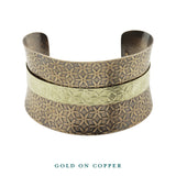 dual tone gold on copper anticlastic cuff front bracelet