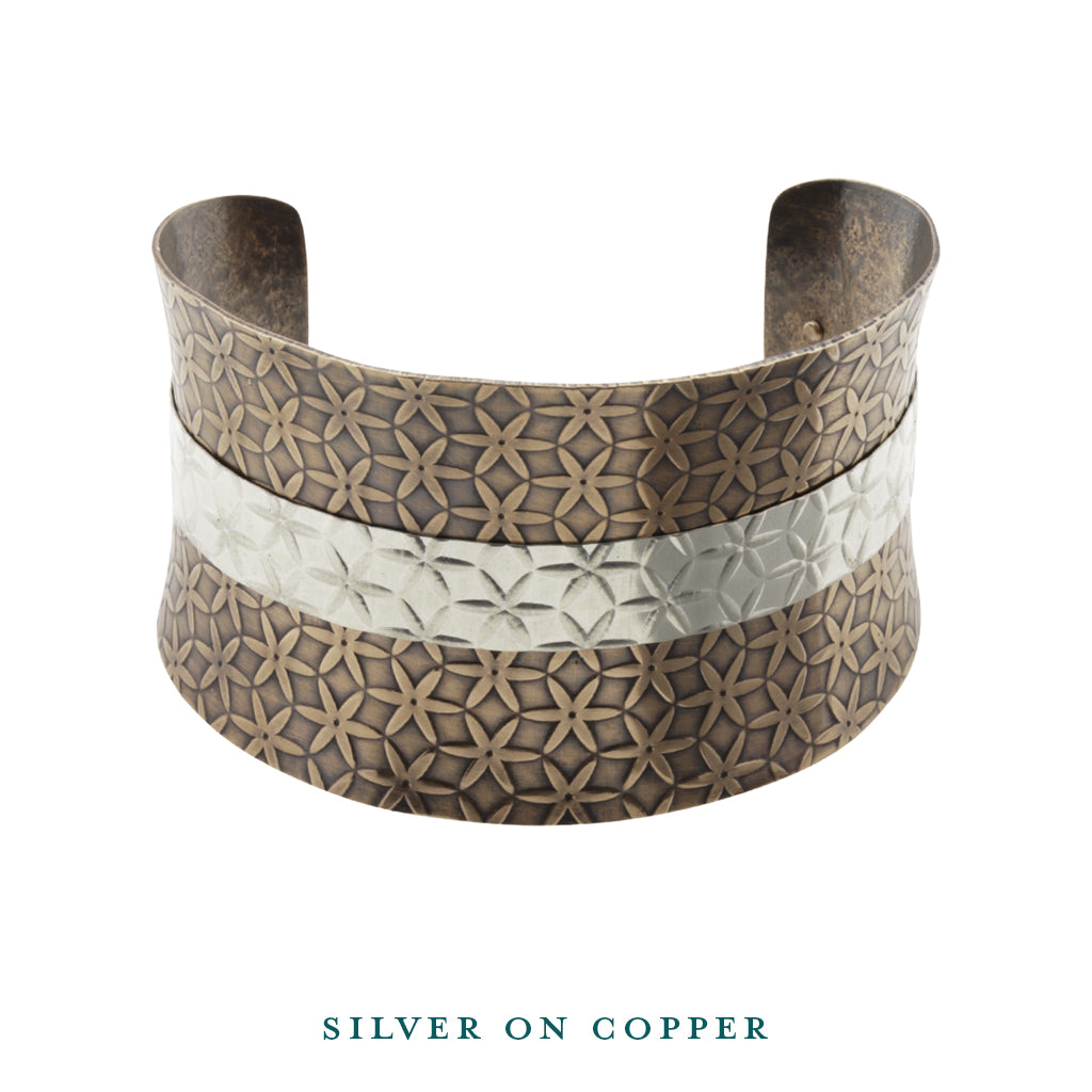 Silver on copper anticlastic cuff bracelet front