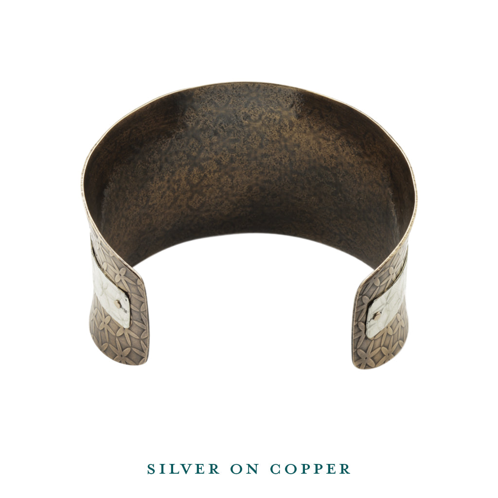 Silver on copper anticlastic cuff bracelet inside